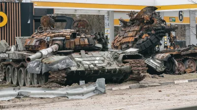 destroyed vehicle in the urban environment